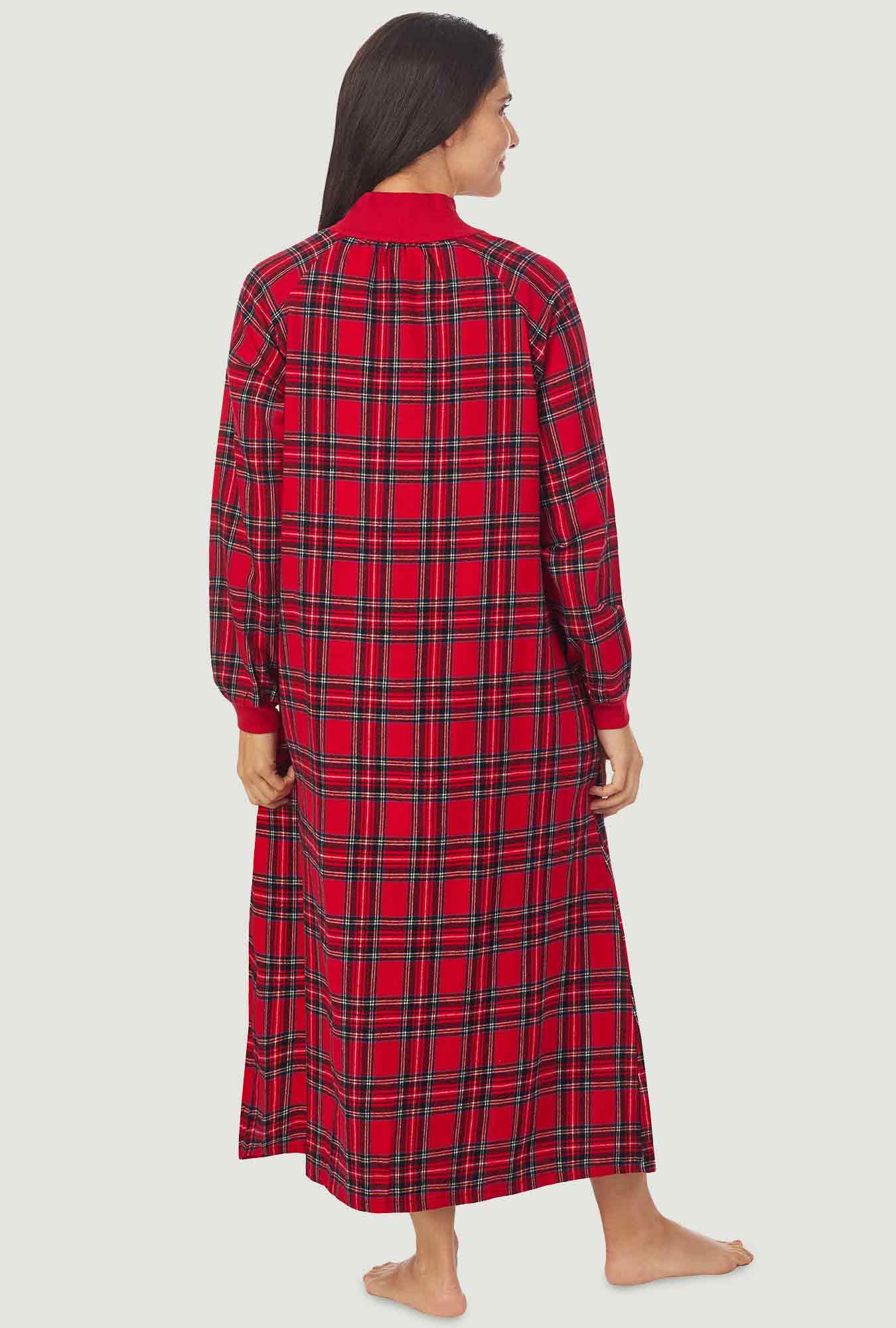  A lady wearing a red tartan long sleeve pop over flannel gown.