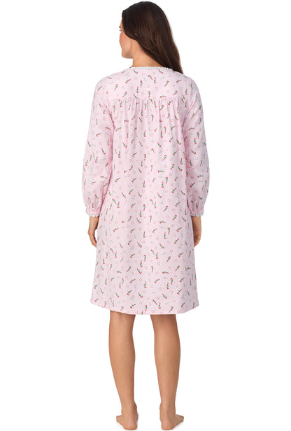 A lady wearing Candy Canes Waltz Flannel Gown