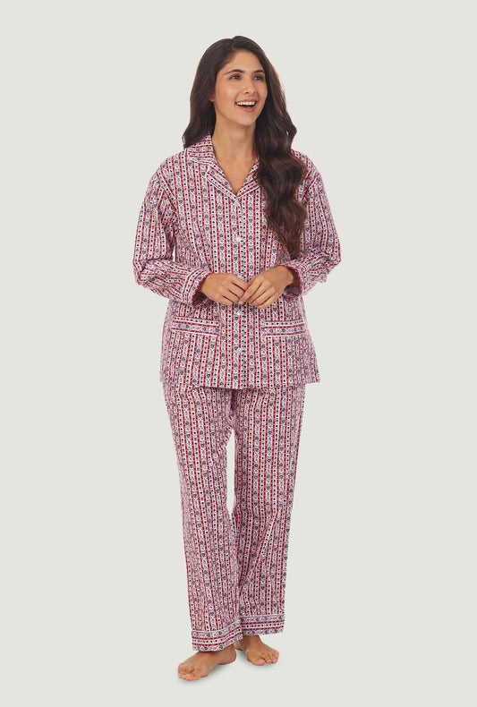 A lady wearing a red tyrolean women's flannel pajama.