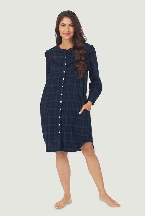 A lady wearing Dark blue plaid nightshirt