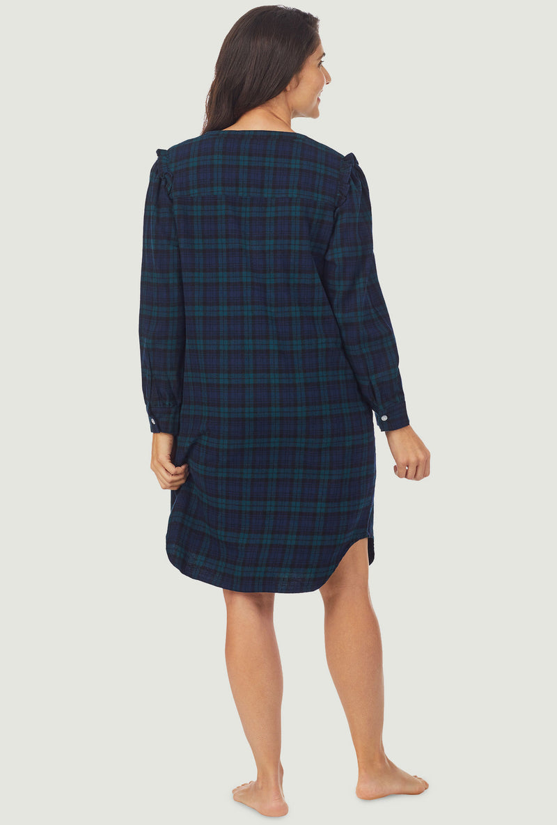 A lady wearing Dark blue plaid nightshirt