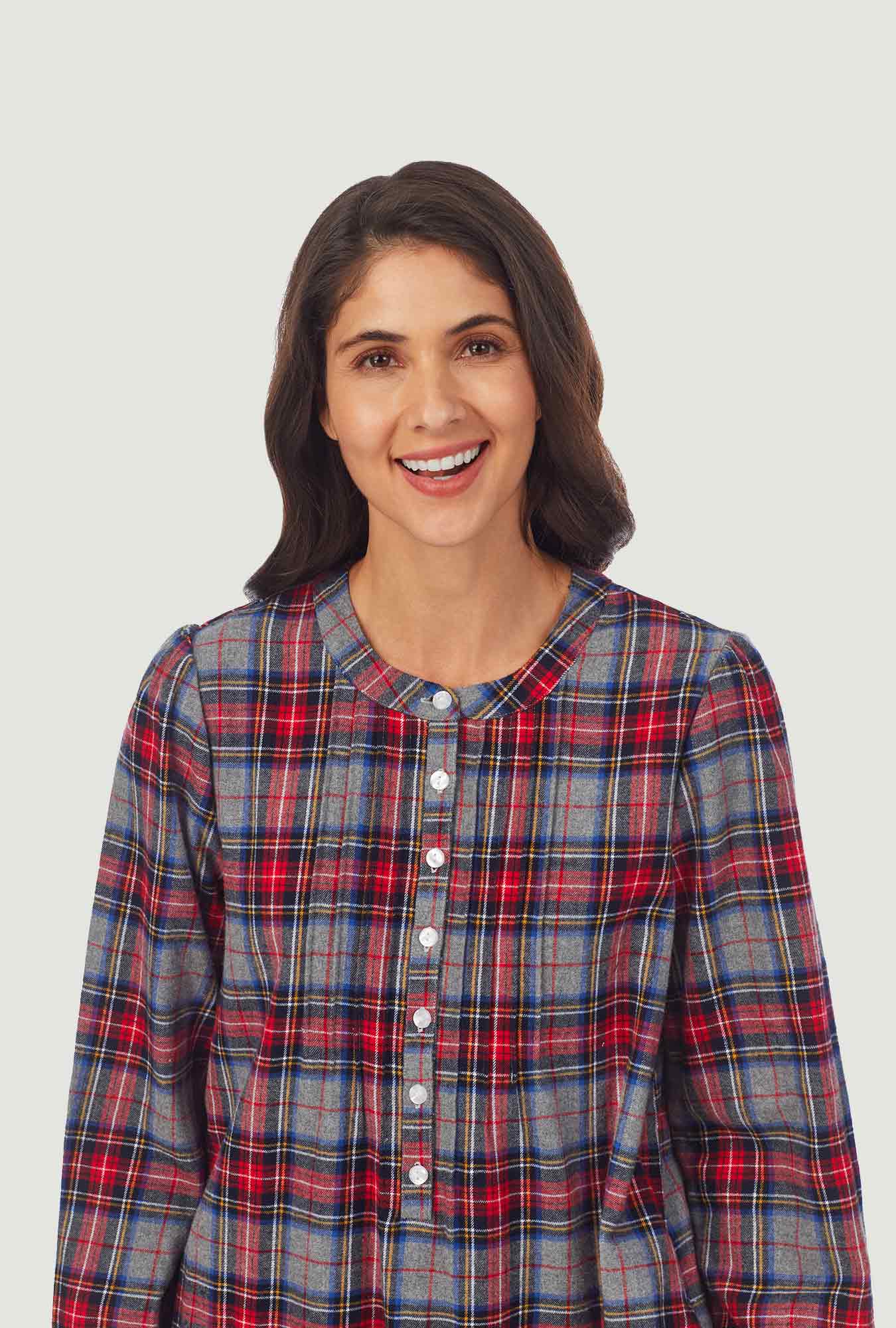  A lady wearing grey plaid flannel gown with long sleeves