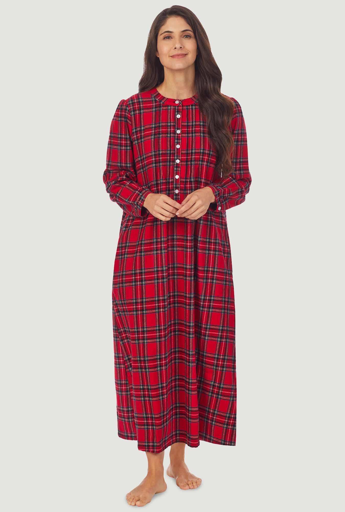 A lady wearing a red tartan long sleeve sweet and simple flannel gown.
