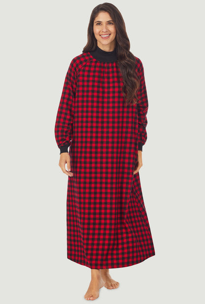 A lady wearing a red buffalo check long sleeve pop over flannel gown.
