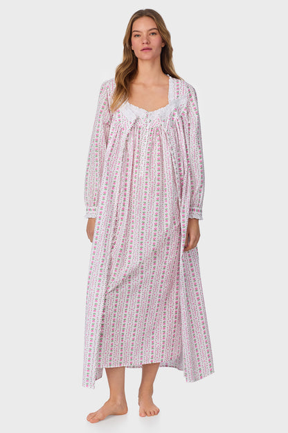 A lady wearing Rosey Tyrolean Cotton Lawn Ballet Button Front Robe