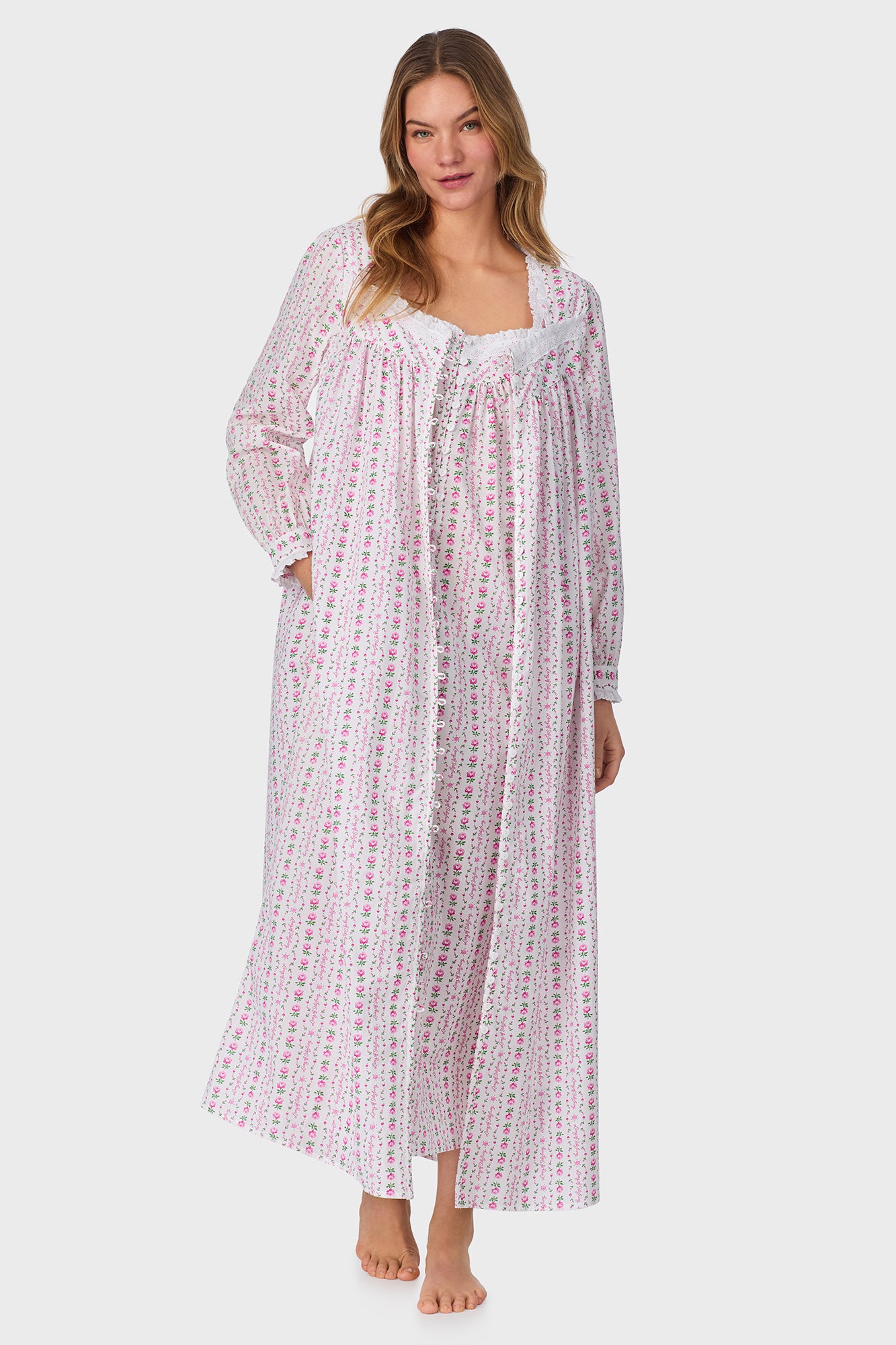 A lady wearing Rosey Tyrolean Cotton Lawn Ballet Button Front Robe
