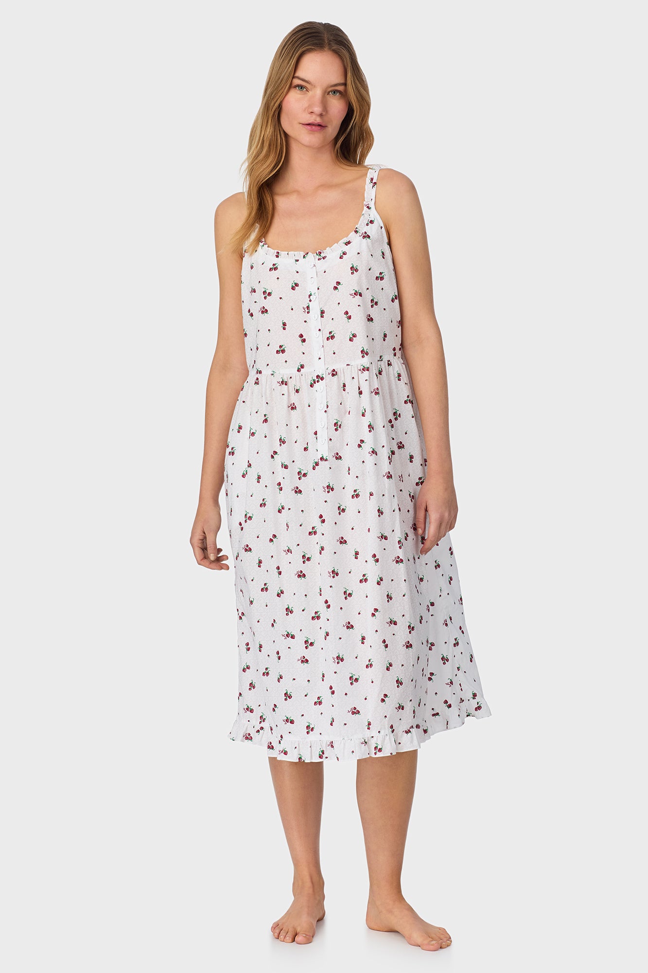 A lady wearing Strawberry Jubilee Cotton Lawn Sundress