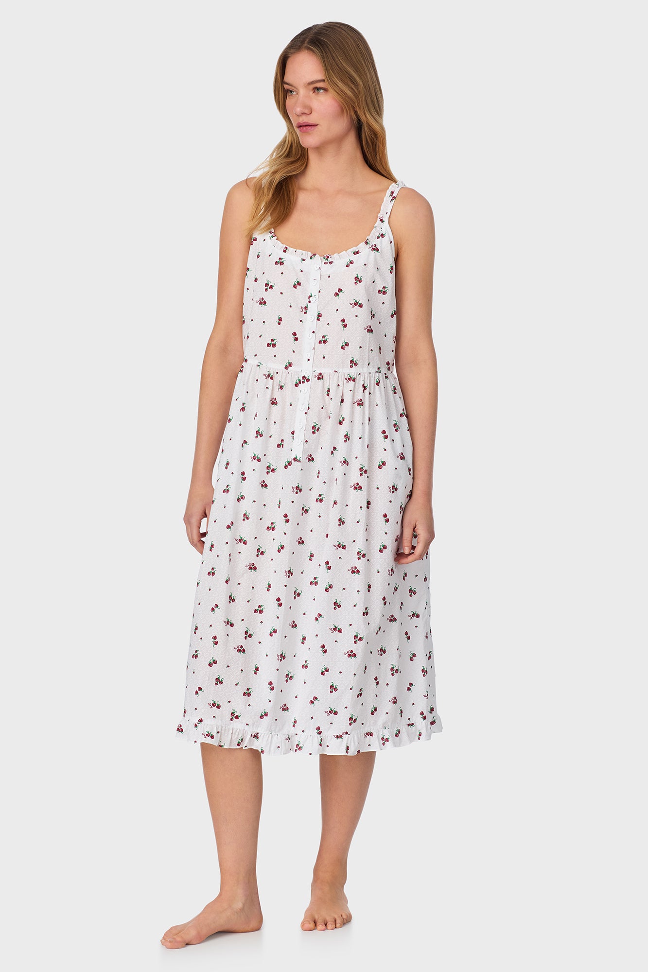 A lady wearing Strawberry Jubilee Cotton Lawn Sundress