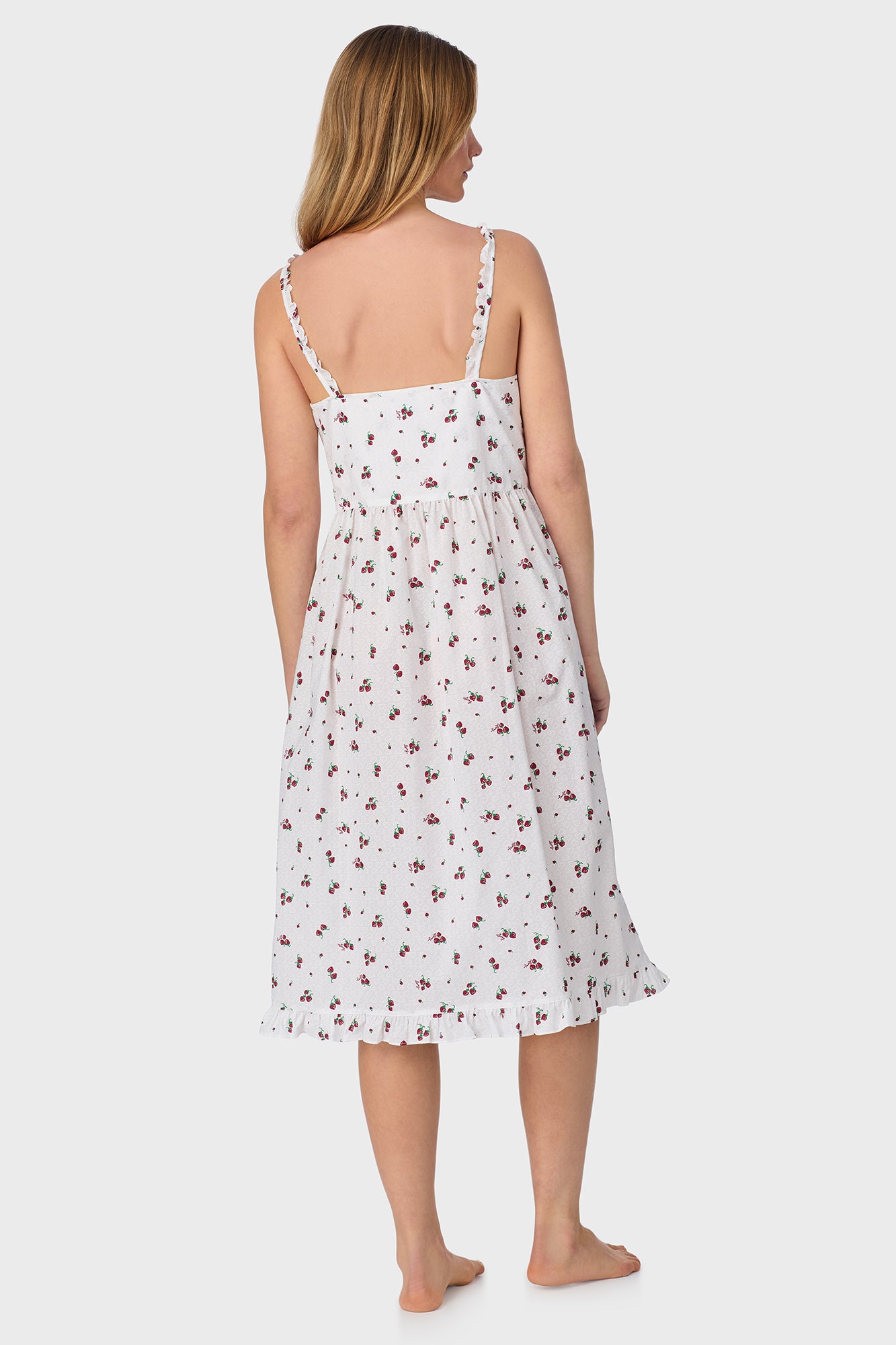 A lady wearing Strawberry Jubilee Cotton Lawn Sundress