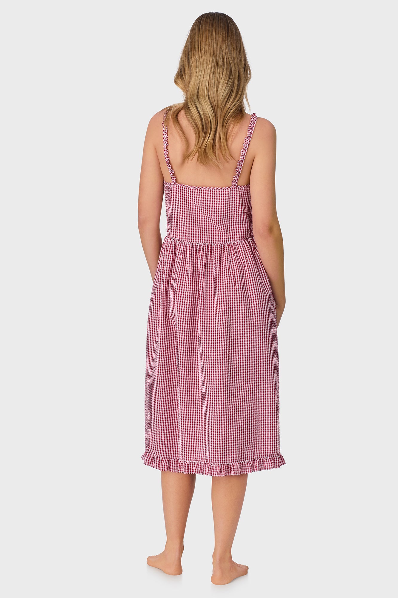 A lady wearing Picnic Plaid Seersucker Yarndye Check Sundress