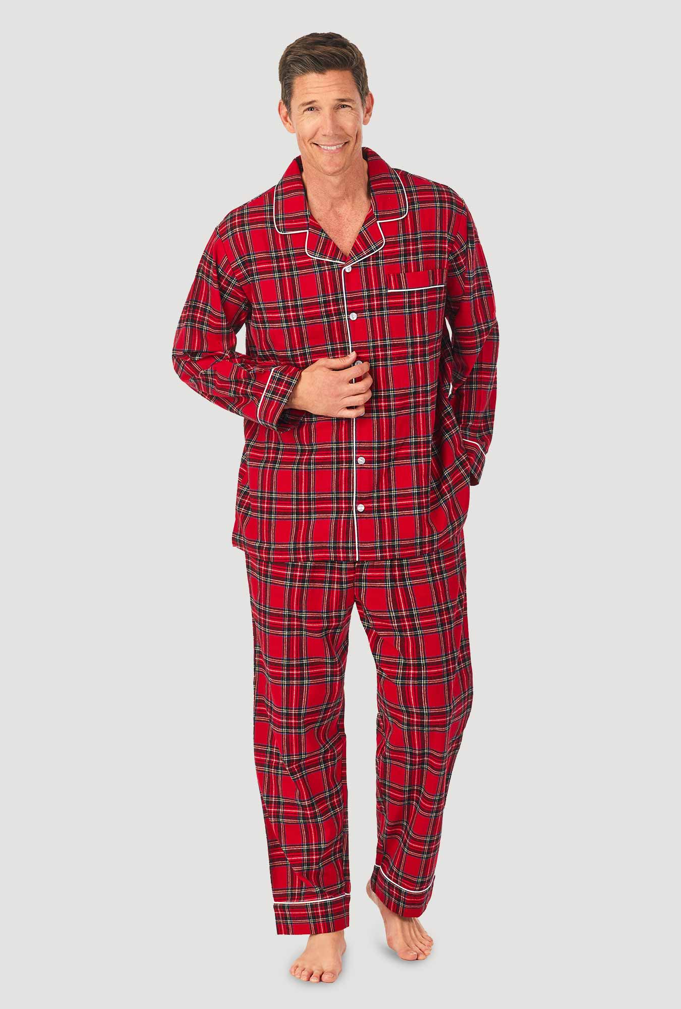 A man wearing a red tartan long sleeve mens flannel pajama.