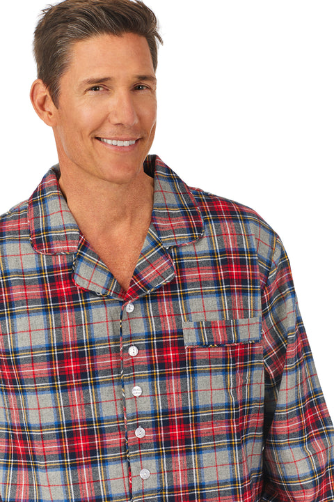 A man wearing a grey plaid long sleeve classic nightshirt.