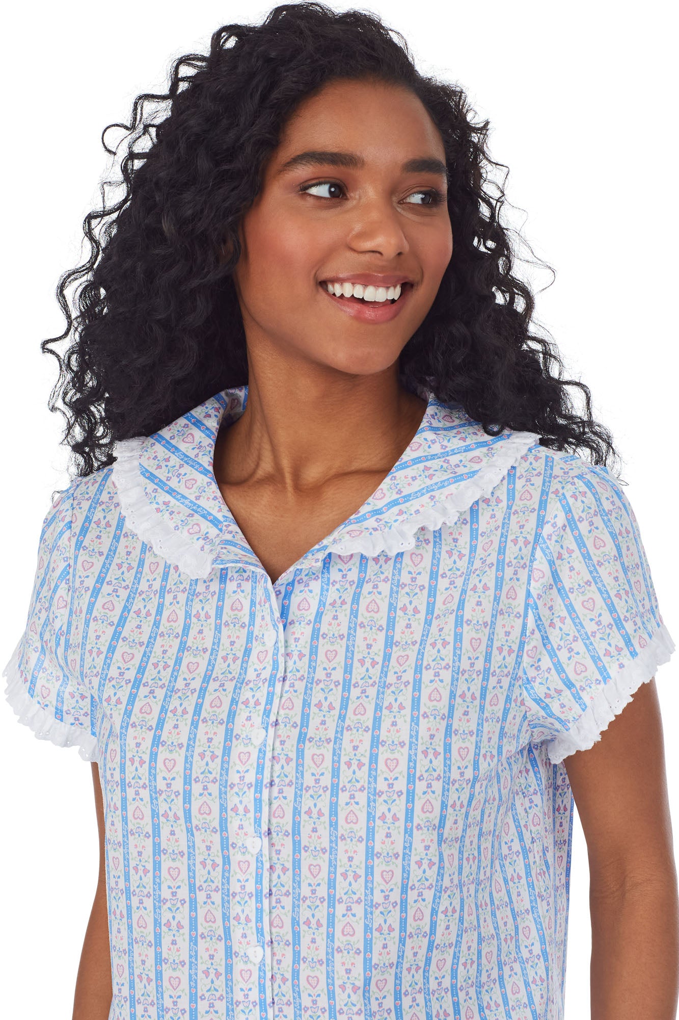 Upper body of A lady wearing white pajama with blue pattern