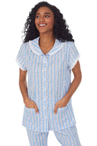 Upper body of A lady wearing white short pajama set with blue pattern