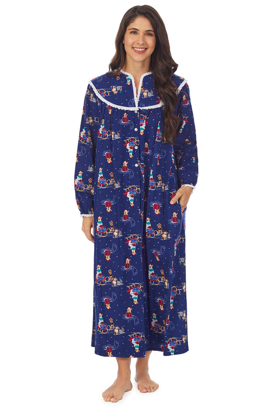 A lady wearing a sleigh puppies long sleeve flannel gown.