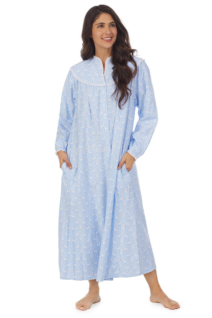 A lady wearing blue flannel gown with white design