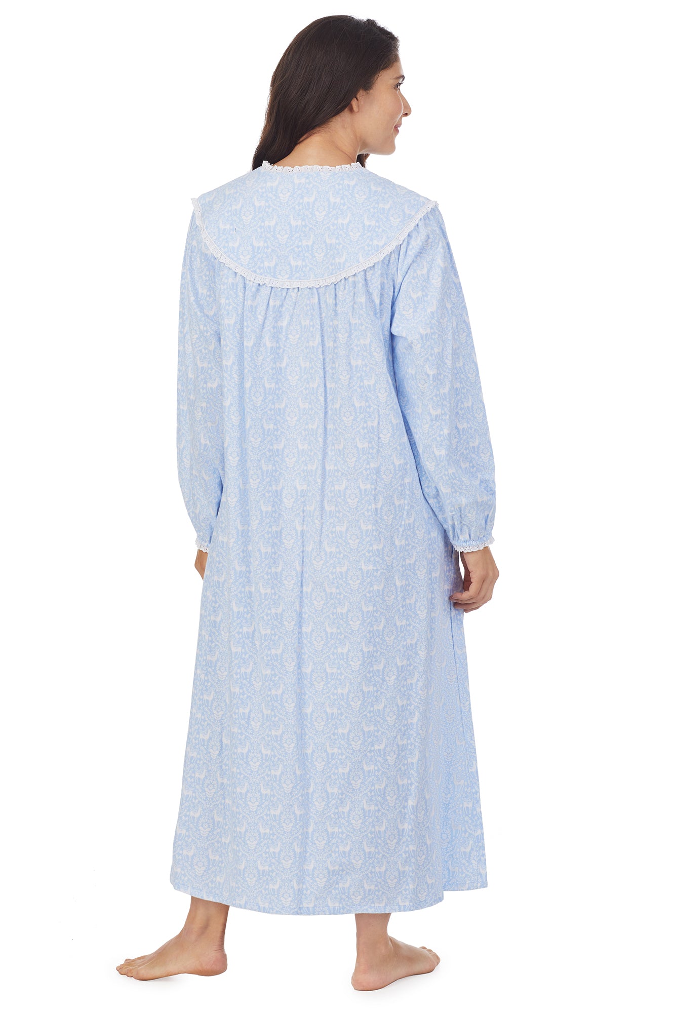 A lady wearing blue flannel gown with white design