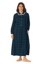 A lady wearing dark blue flannel gown with plaid pattern