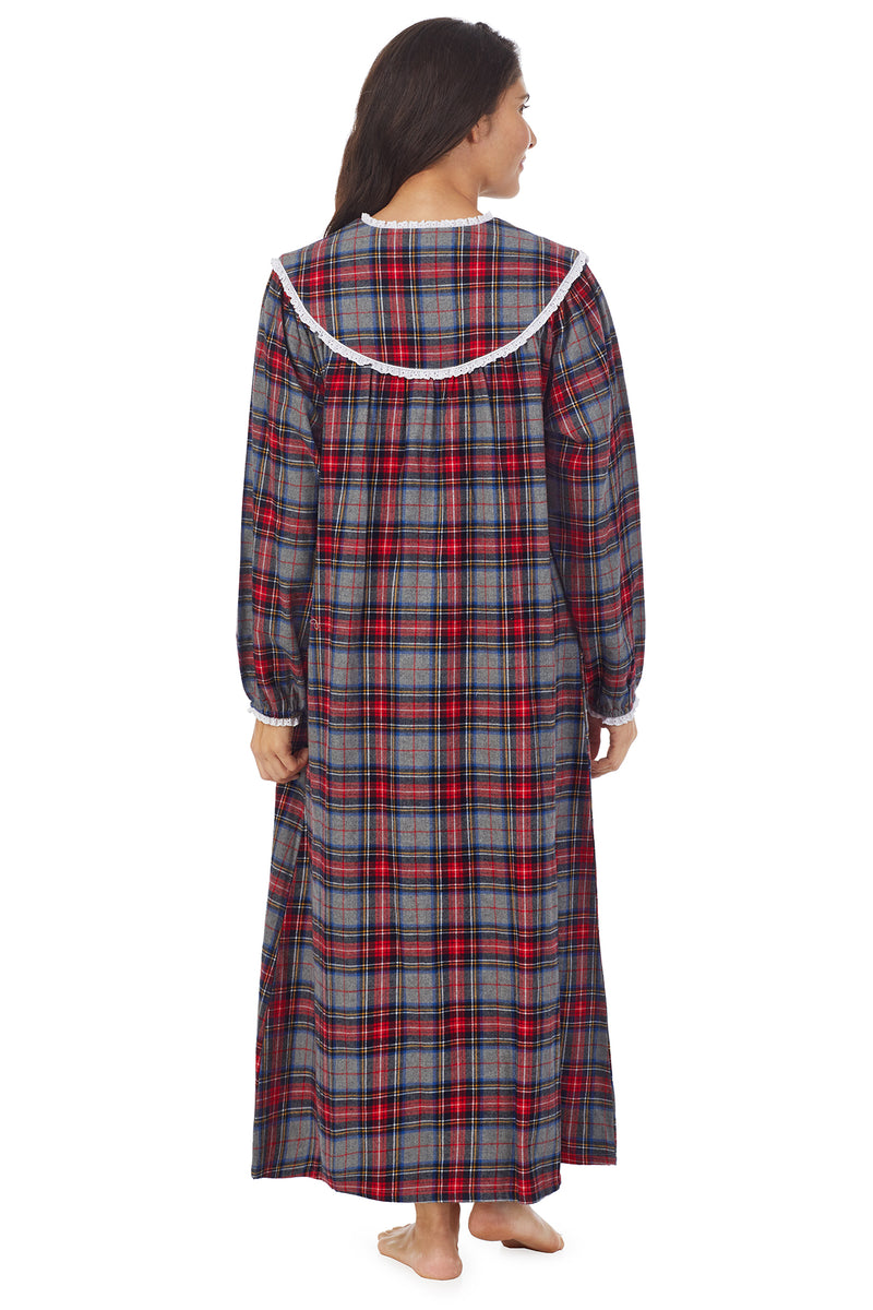 A lady wearing grey flannel gown with red plaid pattern