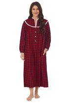 A lady wearing a red buffalo check long sleeve flannel gown.