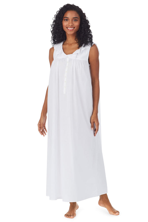 A lady wearing white long nightgown